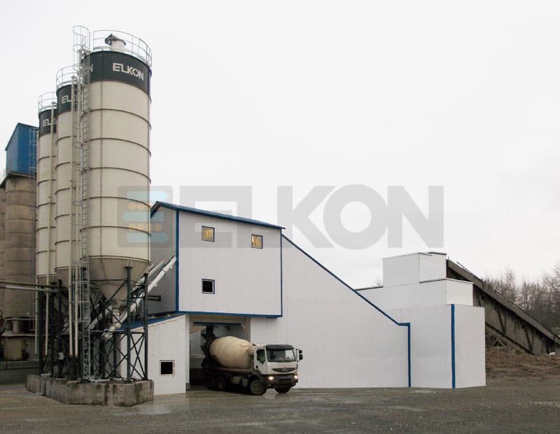 Concrete plant with silos and mixing truck