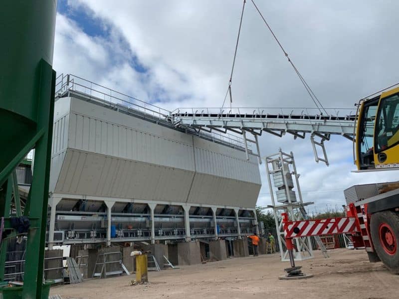 Construction site with large industrial machinery crane.
