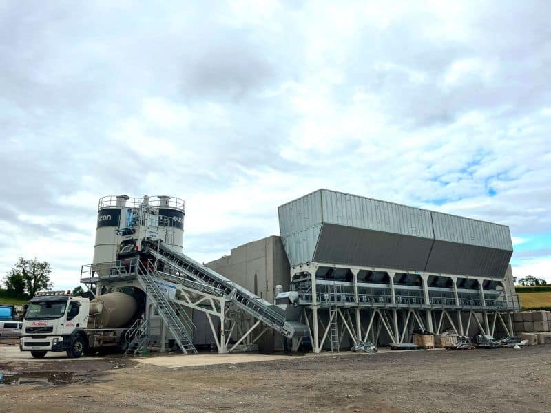 Concrete plant with cement mixer truck and silos